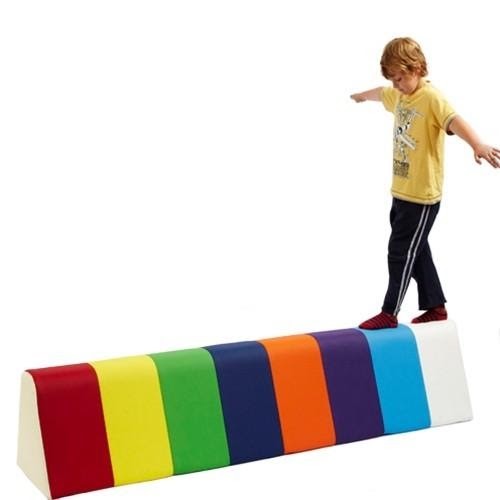 child using balance beam